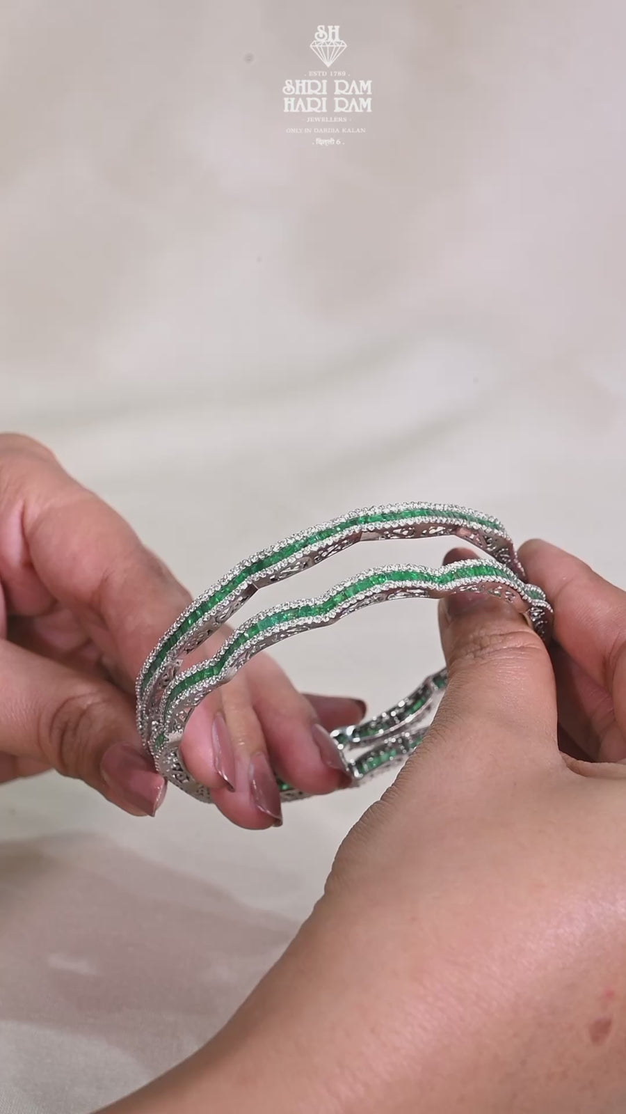 Sleek Emerald Diamond Bangles